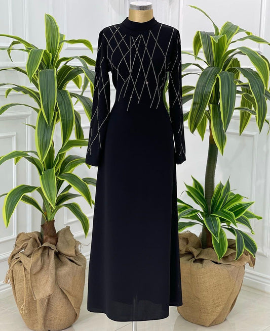 Robe longue noire avec motifs géométriques en strass